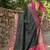 Green patola silk blend saree with zari woven work and fancy tassel pallu