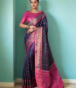 Blue patola silk blend saree with zari woven work and fancy tassel pallu