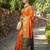 Orange patola silk blend saree with zari woven work and fancy tassel pallu