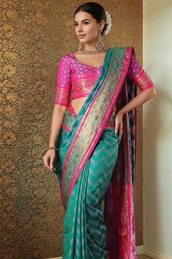 Rama patola silk blend saree with zari woven work and fancy tassel pallu