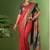 Red patola silk blend saree with zari woven work and fancy tassel pallu