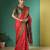 Red patola silk blend saree with zari woven work and fancy tassel pallu