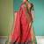 Red patola silk blend saree with zari woven work and fancy tassel pallu