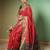 Red patola silk blend saree with zari woven work and fancy tassel pallu