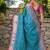 Turquoise patola silk blend saree with zari woven work and fancy tassel pallu
