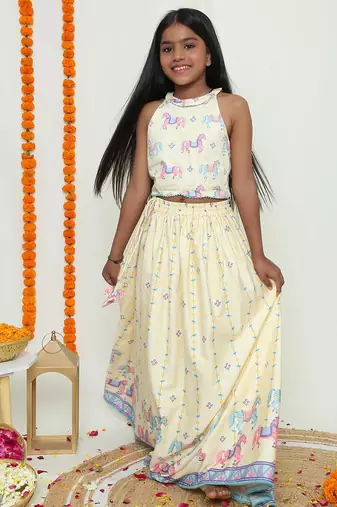 Butter yellow with carasouel print/lehenga with halter neck blouse