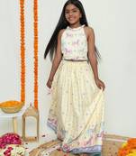 Butter yellow with carasouel print/lehenga with halter neck blouse