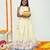 Butter yellow with carasouel print/lehenga with halter neck blouse