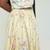 Butter yellow with carasouel print/lehenga with halter neck blouse