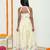 Butter yellow with carasouel print/lehenga with halter neck blouse