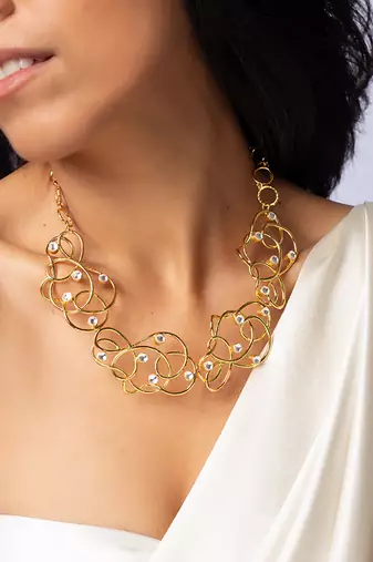 Elegant swirl pearl accent high gold necklace