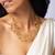 Elegant swirl pearl accent high gold necklace
