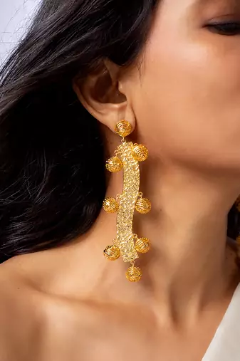 Regal swirl high gold statement earrings