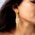 Baroque pearl dagger drop earrings