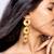 High gold triple disc dangling earrings