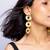 High gold triple disc dangling earrings