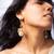 High gold pearl drop statement earrings