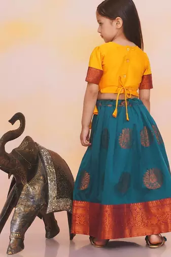 Yellow plain silk jacquard pattu pavdai for girls
