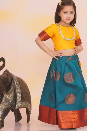 Yellow plain silk jacquard pattu pavdai for girls