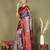 red and teal silk blend saree with rich woven pallu