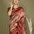 red and cream silk blend saree with rich woven pallu