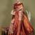 red and cream silk blend saree with rich woven pallu