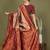 red and cream silk blend saree with rich woven pallu