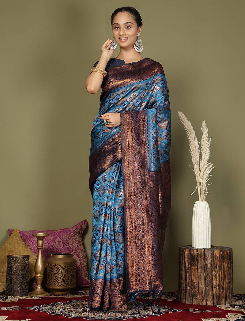 red and sky blue silk blend saree with rich woven pallu