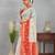 Traditional white and red art silk saree with gold accents