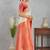 Traditional white and red art silk saree with gold accents