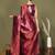 red and light pink silk blend saree with rich woven pallu