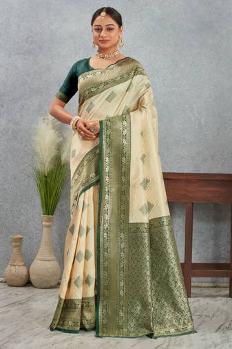 Elegant cream and green banarasi silk saree with zari detailing