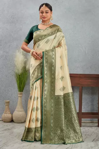 Elegant cream and green banarasi silk saree with zari detailing