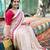 Elegant off-white saree with red stripes and geometric border