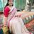 Elegant off-white saree with red stripes and geometric border