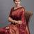 Maroon banarasi silk blend saree with copper zari woven pallu