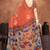 Earthy terracotta saree with artistic floral pallu