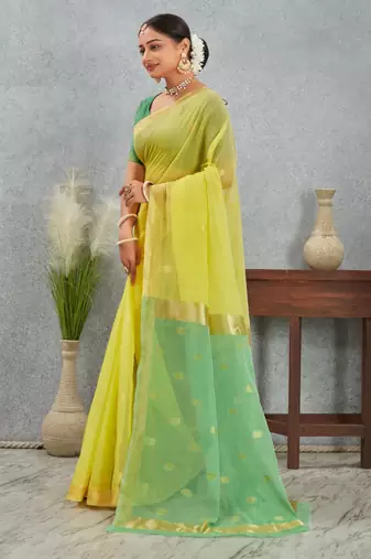 Elegant yellow and green cotton silk saree with golden border