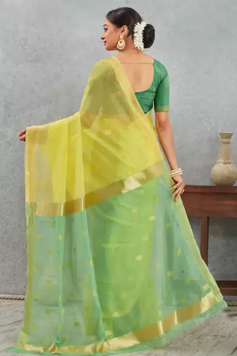 Elegant yellow and green cotton silk saree with golden border