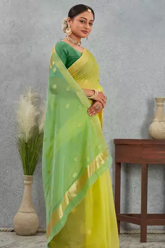 Elegant yellow and green cotton silk saree with golden border