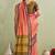Elegant pink and olive traditional saree with striped pallu