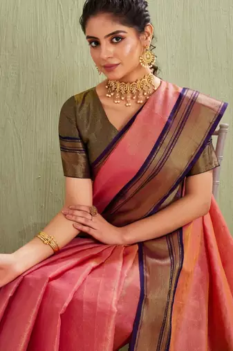 Elegant pink and olive traditional saree with striped pallu
