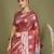 Rust floral linen cotton saree with zari border and digital printed pallu
