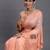 peach linen cotton saree with woven pallu butta work and tassels