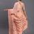 peach linen cotton saree with woven pallu butta work and tassels