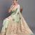 light green linen cotton saree with woven pallu butta work and tassels