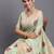 light green linen cotton saree with woven pallu butta work and tassels