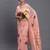 light pink linen cotton saree with woven pallu butta work and tassels