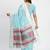 Sky blue linen saree with multicolor weaving and zari pallu