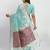 Sea green linen saree with multicolor weaving and zari pallu